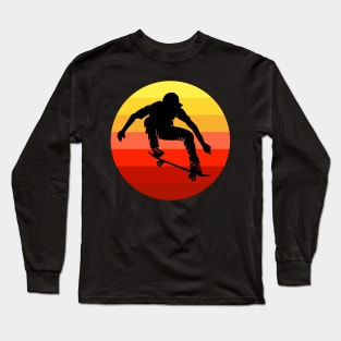 Extreme skateboarder flying in front of retro vintage sunset Long Sleeve T-Shirt